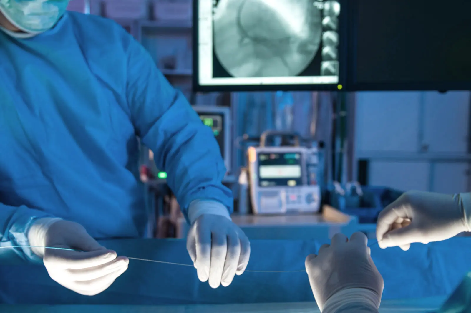 A guidewire being advanced during a cardiac catheterization procedure